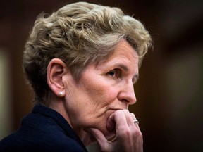 Files: Ontario Premier Kathleen Wynne speaks at the hearings into the gas plant cancellations at Queen's Park in Toronto on December 3, 2013. (Mark Blinch/The Canadian Press)
