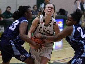 St. Clair's Jaide Lyons, centre, makes a move between Sheridan's Haeven Durrant, left, and Shylanda Saunders at St. Clair College in Windsor on Friday, January 24, 2013.                           (TYLER BROWNBRIDGE/The Windsor Star)
