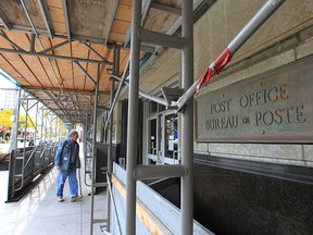 Scaffolding surrounds the Paul Martin building at the corner of Ouellette and Pitt in Windsor, Ont. in this 2012 file photo. (DAN JANISSE / The Windsor Star)