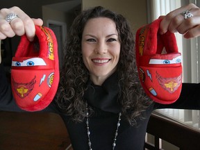 Stacey MacKinnon, a local nurse collected more than 500 pairs of shoes in the Windsor area and will be travelling to Ghana with some Rotarians to hand them out. She poses Wed. Jan. 8, 2014, at her Windsor, Ont. residence.  (DAN JANISSE/The Windsor Star)