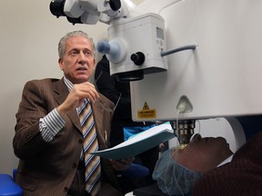Dr. Fouad Tayfour uses a laser on a patient with a cataract at his Windsor Laser Eye Institute on Walker Road.  (DAN JANISSE/The Windsor Star)