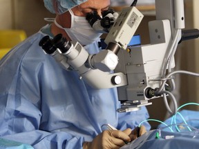 Dr. Fouad Tayfour performs eye surgery on a patient in this file photo from 2011.