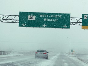 Highway 401 during nasty winter weather near Windsor on Jan. 25, 2014. (Dax Melmer / The Windsor Star)