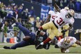 LaSalle's Luke Willson, left, loses the ball after a hit by San Francisco's Donte Whitner during the NFC Championship Sunday, Jan. 19, 2014, in Seattle. (AP Photo/Ted S. Warren)