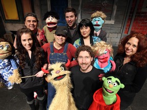 Actors Kathy Roberts, left, Joe Cardinal, Lia Pizzuti, Christopher Lawrence-Menard, Kim McInnis, Kevin Scott and Tracey Atin rehearse for the performance of Avenue Q at the Chrysler Theatre in Windsor.  (TYLER BROWNBRIDGE / The Windsor Star)