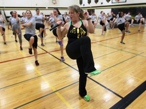Bokwa fitness instructor Tanya Fryer leads a class at Riverside high school in Windsor. (DAN JANISSE / The Windsor Star)