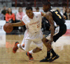 Windsor’s Darren Duncan, left, is guarded by London’s Tony Bennett Friday at the WFCU Centre. (DAN JANISSE/The Windsor Star)