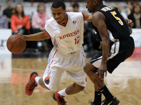 Windsor's Darren Duncan, left, is guarded by London's Tony Bennett Friday at the WFCU Centre. (DAN JANISSE/The Windsor Star)