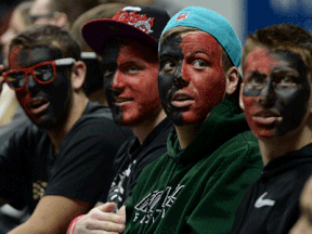 A group of Windsor Express fans had their game faces on during Friday's game against Mississauga at the WFCU Centre. (DAN JANISSE/The Windsor Star)