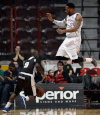 Mississauga’s George Williams, left, is covered by a high-flying George Goode of Windsor during their game Friday at the WFCU Centre. (DAN JANISSE/The Windsor Star)