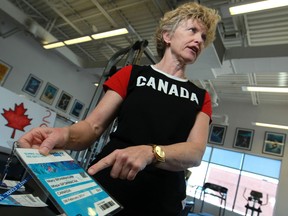 Physiotherapist Mary Brannagan, who works with Canadian figure skaters Tessa Virtue and Scott Moir, is pictured at Loaring Physiotherapy, Saturday, Feb. 22 , 2014. (DAX MELMER/The Windsor Star)