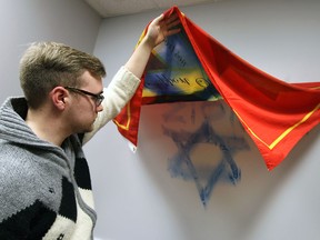 Jake De Jong, vice-president of academic affairs for the University of Windsor Student Alliance, shown Thursday, Feb. 27, 2014, in his office in the UWSA, which was vandalized. The student association at the U of W is in the middle of a controversial referendum and many think it is related.                 (TYLER BROWNBRIDGE/The Windsor Star)