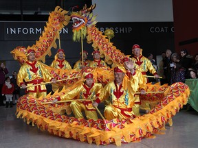 The Essex County Chinese Canadian Association celebrated the Chinese new year, Sunday, Feb. 2, 2014, at the Art Gallery of Windsor. The celebration included dancing, food, crafts and music. The traditional dragon dancers perform during the event.  (DAN JANISSE/The Windsor Star)