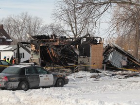 The Ontario Fire Marshal's office has been called in on Monday, Feb. 17, 2014, to assist Lakeshore Fire Department and the Ontario Provincial Police in the investigation in the cause of a weekend house explosion at 189 Puce Rd. in Lakeshore, Ontario. (JASON KRYK/The Windsor Star)