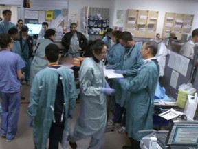 Doctors and nurses rush to save the life of a stabbing victim in Vancouver General Hospital's emergency department. (Photograph by: Submitted , Knowledge Network)