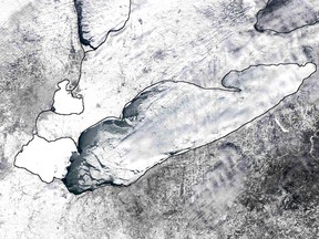 Satellite image of Lake Erie taken on Feb. 7, 2014, showing nearly  all its surface covered in ice. (Windsor Star handout photo)