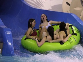 Riders get spit out of a water slide at the Adventure Bay Family Water Park in Windsor on Wednesday, January 29, 2014. (TYLER BROWNBRIDGE/The Windsor Star)