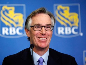 In this file photo, Gordon Nixon, president and CEO of the Royal Bank of Canada, smiles in Calgary, on Feb. 28, 2013. Canadian bankers were among some of the highest-paid banking executives in North America last year, with three in the Top 10, according to a new list compiled by Bloomberg Markets magazine. Nixon, who came in at No. 4 with a total pay package at US$12.6 million. (THE CANADIAN PRESS/Jeff McIntosh)