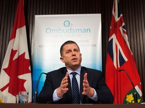 In this file photo, Ontario Ombudsman Andre Marin speaks at a news conference at Queens Park in Toronto on Tuesday February 4, 2014. (THE CANADIAN PRESS/Aaron Vincent Elkaim)