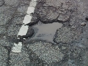Pothole in the bike lane on Lincoln Road in this Star file photo.
