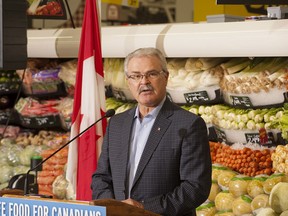In this file photo, Agriculture Minister, Gerry Ritz, announces in Saskatoon, Friday, May 17, 2013, the Safe Food for Canadians Action Plan, which aims to further improve Canada's food safety system through stronger food safety rules, more effective inspection, a renewed commitment to service and more information for consumers.  (MARKETWIRED PHOTO/Government of Canada)