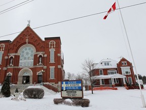 St. Joseph Church s shown Sunday, Feb. 2, 2014. Amherstburg council on Monday reversed a previous decision and approved  demolition to the St. Joseph Church rectory, which is on the right in the photo. (DAN JANISSE/The Windsor Star)