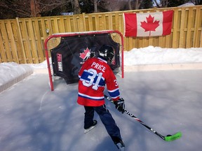 Thomas DeSantis 'Go-Team-Canada' on the DeSantis family rink on Redwood Road in Kingsville, Ont. (JoAnne DeSantis/Special to The Star)