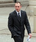 Trevor Skeates walks between Ontario Provincial Court and the Superior Court of Justice on February 25, 2014 in Windsor, Ont.  (Windsor Star photo)