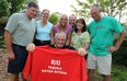 In this file photo, Dr. Ray LaRocque is surrounded by Mike LaRocque, left, Mary LaRocque, Lynn Morgan, Steve LaRocque, Jeanne LaRocque and Tim LaRocque at his home in Windsor on Tuesday, May 15, 2012. LaRocque has been taking his entire family on an annual vacation. The trips have involved up to 63 people.         (TYLER BROWNBRIDGE / The Windsor Star)