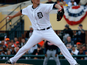Tigers relief pitcher Joe Nathan throws a pitch in the fifth inning of an exhibition spring training game against the Atlanta Braves in Lakeland, Fla. (AP Photo/Gene J. Puskar)