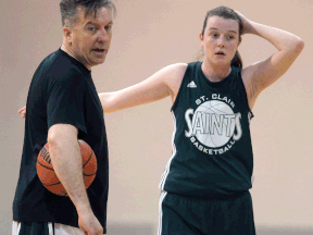 St. Clair coach Andy Kiss, left, and Shannon Kennedy take a break at practice. (DAN JANISSE/The Windsor Star)