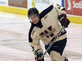 Spits defenceman Blake Parlett takes a slapshot against the Saginaw Spirit in OHL action at Windsor Arena in 2007. (NICK BRANCACCIO/The Windsor Star)