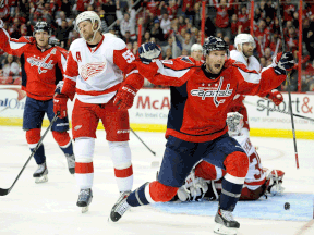 Washington's Troy Brouwer, right, celebrates after scoring in the third period against the Detroit Red Wings at Verizon Center. (Photo by Greg Fiume/Getty Images)