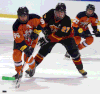 Sandwich’s Colin Ritzer, left, is checked by Cam Davison of Essex at the Vollmer Centre. (TYLER BROWNBRIDGE/The Windsor Star)