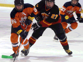 Sandwich's Colin Ritzer, left, is checked by Cam Davison of Essex at the Vollmer Centre. (TYLER BROWNBRIDGE/The Windsor Star)