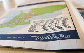 A copy of the National Post is seen in Windsor on Wednesday, February 26, 2014. The City of Windsor has taken out a half page ad urging support for the auto sector.                 (TYLER BROWNBRIDGE/The Windsor Star)