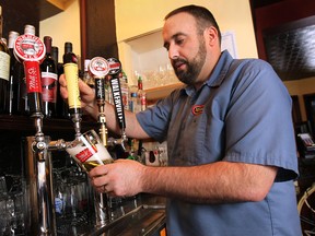 Rino Bortolin is shown Fri. Feb. 14, 2014, at his restaurant in Windsor, Ont. He is organizing a Beer Store boycott and will only serve micro or craft brewery beer. (DAN JANISSE/The Windsor Star)