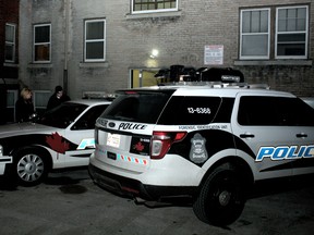 Windsor Police Services Major Crimes Unit arrives at the Ambassador Apartment building at 1382 Ouellette Ave. Saturday, Feb. 22, 2014, after a dead body was found in an apartment. (JOEL BOYCE/The Windsor Star)