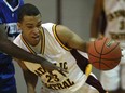 Catholic Central's Isaiah Familia scored a game-high 19 points as the Comets beat the Herman Green Griffins 60-44 Sunday night in the WECSSAA senior boys Tier I basketball final at the WFCU Centre. (DAX MELMER/The Windsor Star)