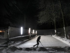 Sylvia Dean, 14, skates in the family's backyard rink, Tues. Feb. 11, 2014, in South Windsor. (DAN JANISSE/The Windsor Star)