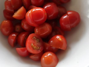 Greenhouse cherry tomatoes are pictured in this 2013 file photo. (Dan Janisse/The Windsor Star)