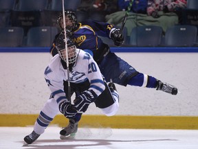 Villanova's Jack Bartlett, left, collides with St. Anne's Jake Lewsaw during game one of WECSSAA boy's hockey final between Villanova and St. Anne's at the Vollmer Complex, Tuesday, Feb. 25, 2014.  (DAX MELMER/The Windsor Star)