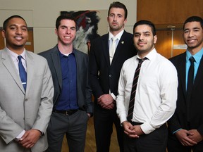 University of Windsor MBA students Brandon Narsingh, 25, left, Ari Unterman, 24, Alex MacIsaac, 22, Ahad Manzoor, 23, and Adam Philp, 23, recently spent a day with American billionaire, Leland Boren, CEO of Avis Industrial Corporation.  (DAX MELMER/The Windsor Star)