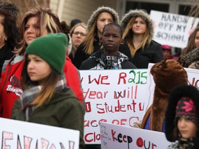 Files: Students, parents, and members of the community rally against the possible closing of St. Maria Goretti Catholic School,  Friday, Feb. 21, 2014.  (DAX MELMER/The Windsor Star)