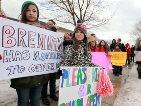 Students, parents, and members of the community rally against the possible closing of St. Maria Goretti Catholic School,  Friday, Feb. 21, 2014.  (DAX MELMER/The Windsor Star)