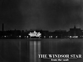 The Canadian Club sign at Hiram Walker shines brightly from across the Detroit River in this undated file photo. (FILES/The Windsor Star)