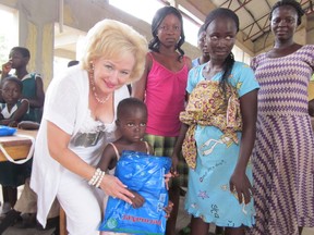 Kim Spirou, left, visits Assin Bereku, Ahana, Africa in November, 2012. (Courtesy of Kim Spirou)