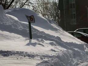 A large snow bank is shown Tues. Feb. 18, 2014, at a parking lot near California Ave. and Wyandotte St. W. (DAN JANISSE/Windsor Star files)