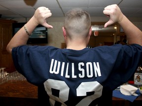 Steve Tunks shows off the name Luke Willson, a former Essex Raven, who will be playing at the Super Bowl XLVIII Sunday, Feb. 2, 2014. (JOEL BOYCE/The Windsor Star)