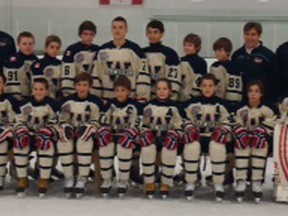 The Windsor Junior Spitfires are competing in the 55th annual Quebec International Pee Wee hockey Tournament in Quebec City. Front row, from left: Keith McGregor, Patrick Godin, Joshua Root, Dean Albano, Tyler Tullio, Joshua Chilcoat, Aaron Shaw, Wyatt O’Neil, Tyler Laureault; back row, from left: assistant coach Stewart Nowosad, Eric Dale, Jack Amyot, Adam Collins, Mitchell MacPherson, Adam Jeffery, Kade Coussens, Brian McCarthy, Trainer Peter Dale, head coach Rocco Tullio.